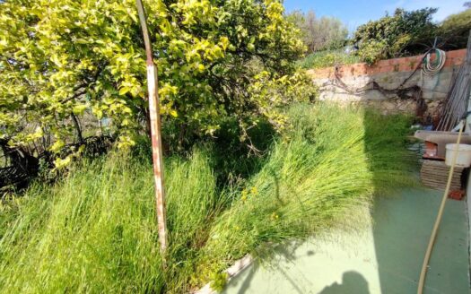 CASA CON TERRENO EN PERIANA